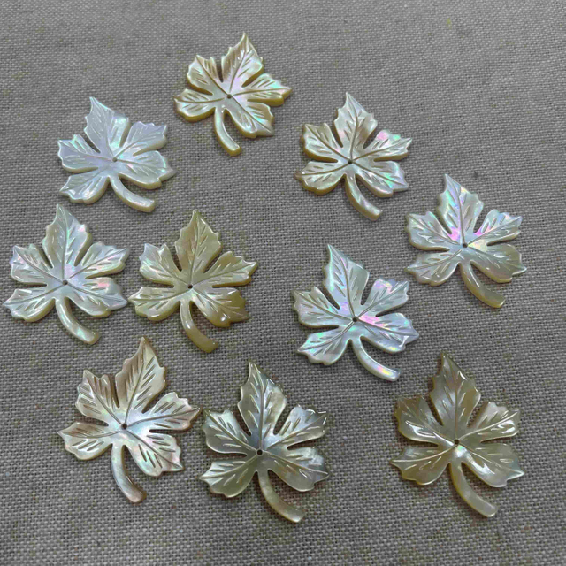 Mother de perla Tallado de la perla forma de la hoja de color amarillo colgante de color que hace diseño de iconos para collar