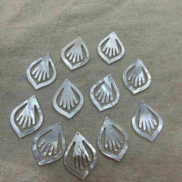 Mother de perla Tallado de perla forma de colgante de colgante de corte de mano joyas que hacen incrustaciones utilizando 