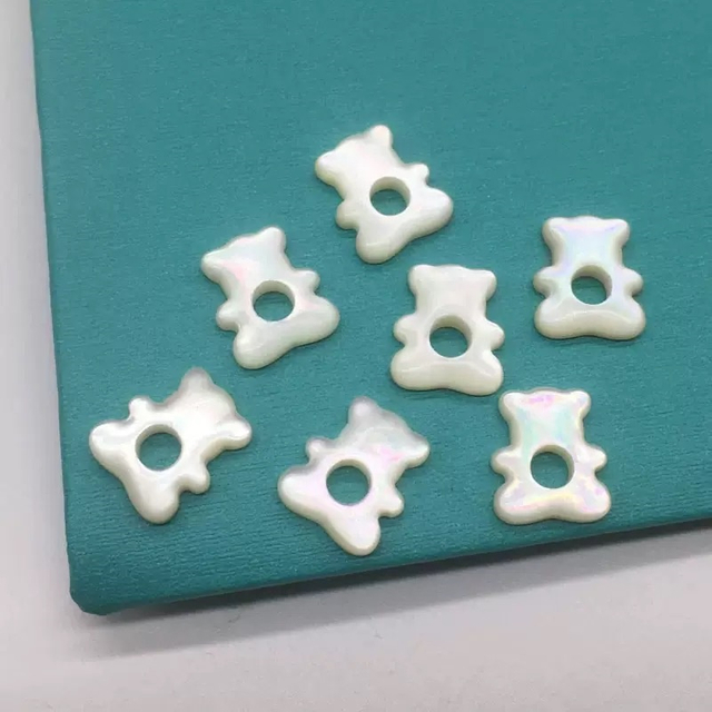 Mother de perla Tallado de perlas forma de cabro de cabujón Diseño de captilla blanca para joyas que hacen collar colgante 