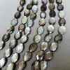 Corte de forma ovalada de nácar Natural para cadena de frijoles con corte de cara de concha negra de doble cara para la fabricación de collares de mujer 