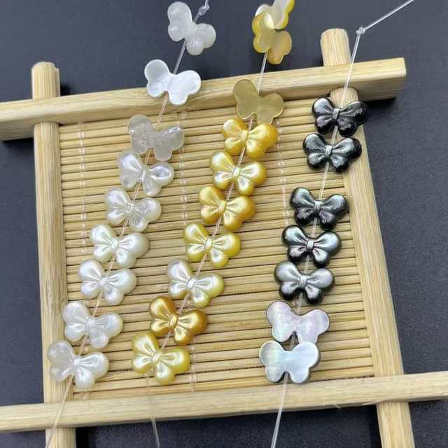 Corte de diseño de lazo de nácar Natural para hacer pulseras, joyería DIY para mujer, bonitos pendientes con forma de lazo, frijoles pequeños de color negro 