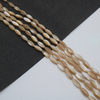 Corte natural en forma de arroz de nácar para joyería, fabricación de collares, pulsera de mujer de color marrón, diseño de iconos de cabujón de bola de frijoles 