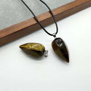 Colgante pequeño de nácar natural de ojos de tigre en forma de gota que corta el diseño de joyería de las mujeres usando collar que hace piedra negra de ópalo