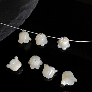 Diseño de bomba de corte con forma de flor de nácar natural para hacer pulseras, joyería para niñas, piezas pequeñas para hacer cadenas, piezas de moda